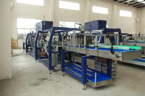 Fardeleuse automatique pour caisse