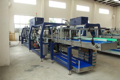 Fardeleuse automatique pour caisse